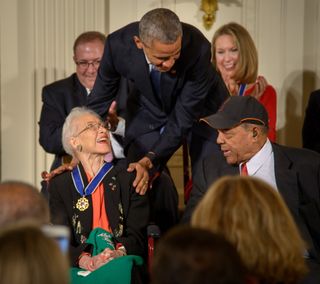 President Barack Obama presents Katherine Johnson with the Presidential Medal of Freedom for her groundbreaking contributions to spaceflight on Nov. 24, 2015.