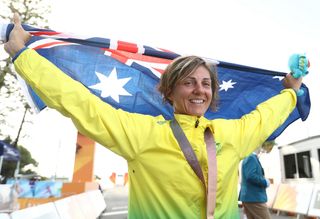 Katrin Garfoot with the Australian flag in celebration of her TT gold medal