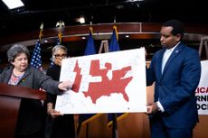 Rep. Lois Frankel, D-Fla., left, points out states with restricted reproductive rights as Rep. Joyce Beatty, D-Ohio, and Rep. Joe Neguse, D-Colo., hold the map during a news conference on reproductive rights in the U.S. Capitol on Wednesday, May 8, 2024