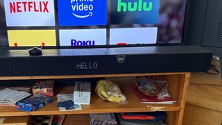 Klipsch Flexus Core 300 on stand with TV in background