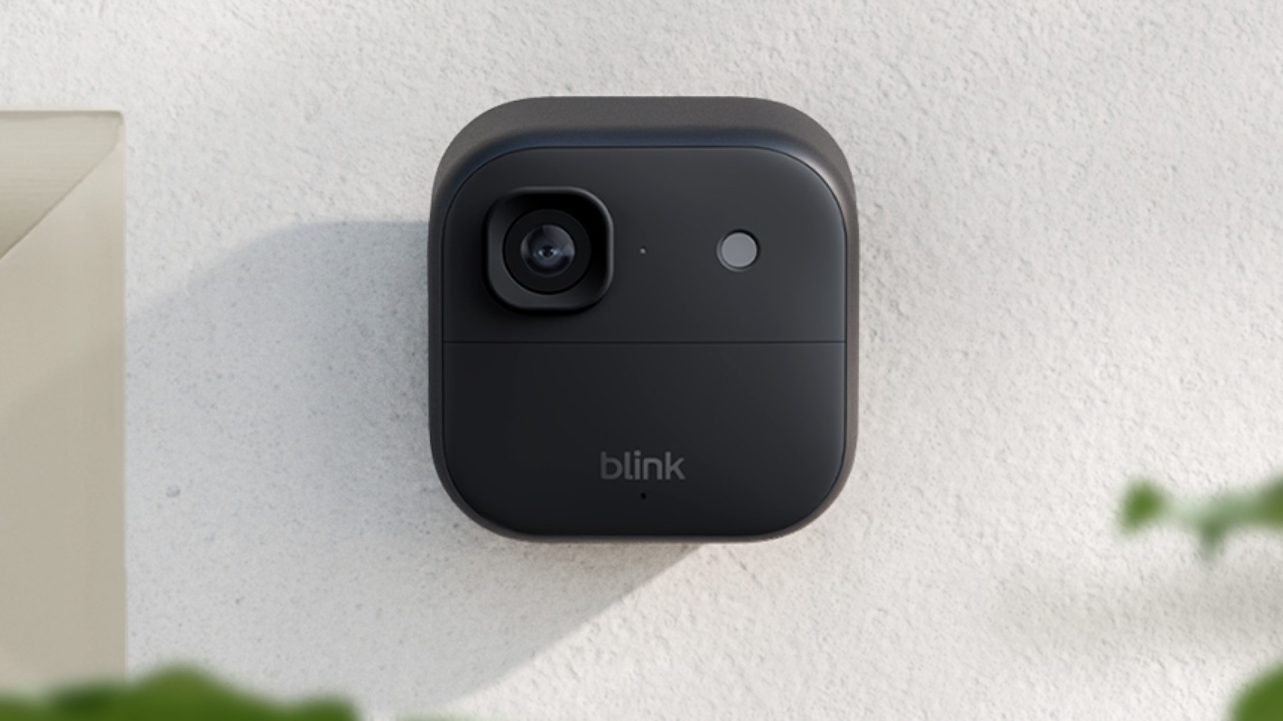 Blink Outdoor 2K+ security camera mounted on wall