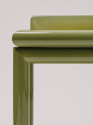 Details of green lacquered wooden stool