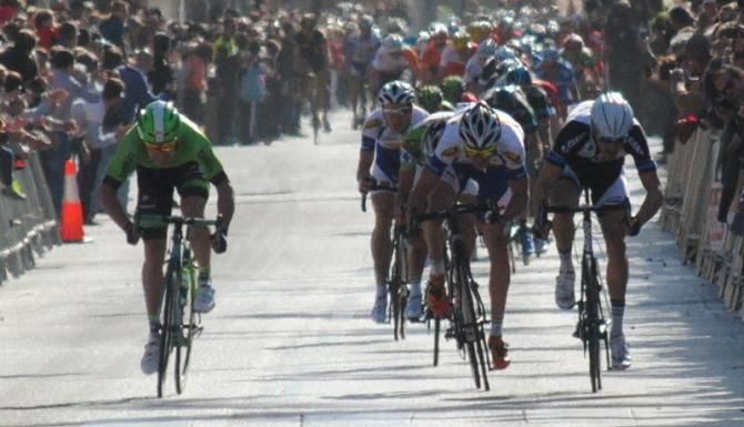 The sprint is on! Topsport Vlaanderen did the lead out in order to catch UCI Europe Tour points with Kenneth Vanbilsen, They developed such a great speed that the peloton split into several groups and gaps were generated.