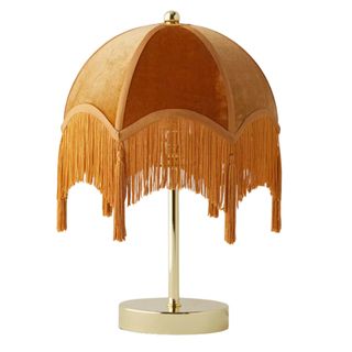 Gold vintage table lamp with a dome shape and tassels 