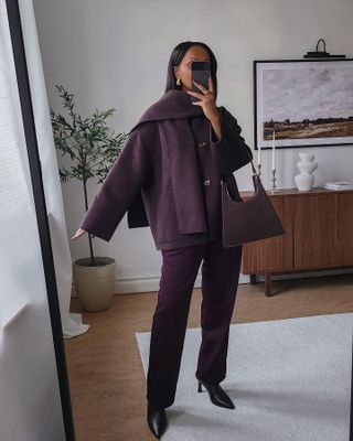 Influencer wears a plum winter outfit