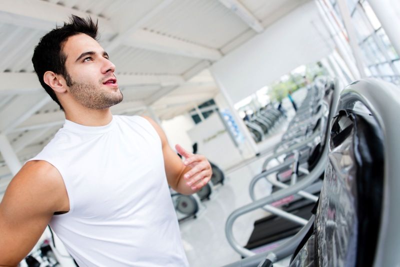 A man runs on a treadmill