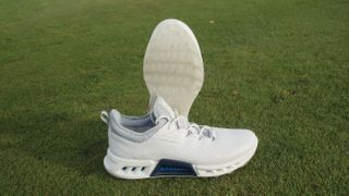 The shoe and outsole of the Ecco Biom C4 golf shoe