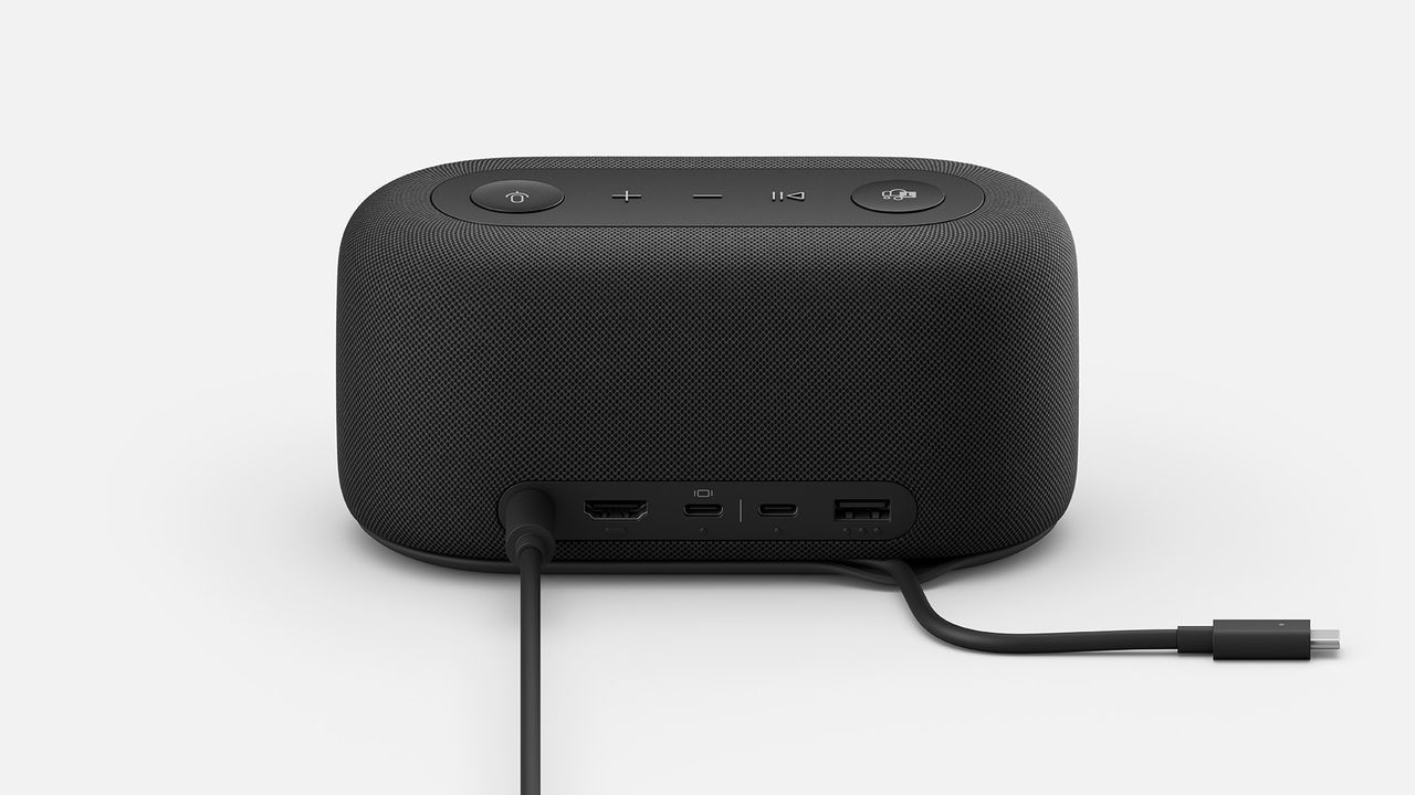 The Microsoft Audio Dock from behind, with two wires attached