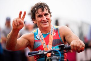 BARCELONA SPAIN SEPTEMBER 30 Former Formula One driver and paracyclist Alex Zanardi poses after finishing IRONMAN Barcelona on September 30 2017 in Calella Barcelona province Spain Photo by Alex CaparrosGetty Images for IRONMAN