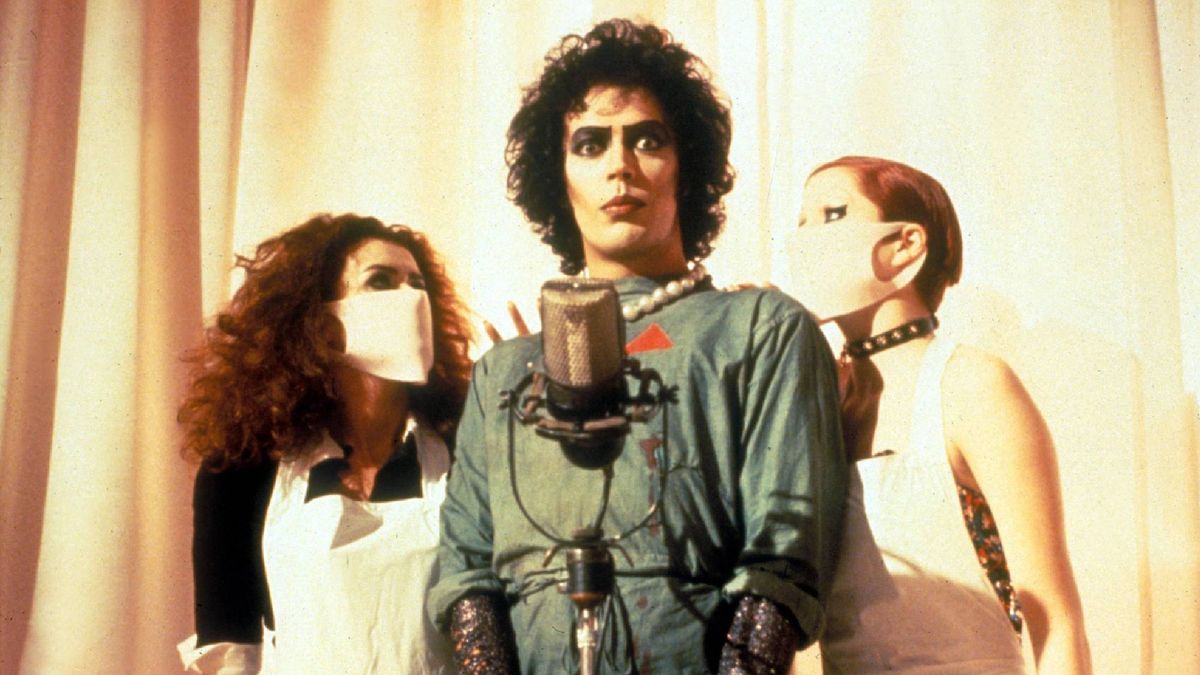 (L-R) Patricia Quinn as Magenta, Tim Curry as Dr. Frank-N-Furter, Little Nell as Columbia in &quot;Rocky Horror Picture Show&quot;