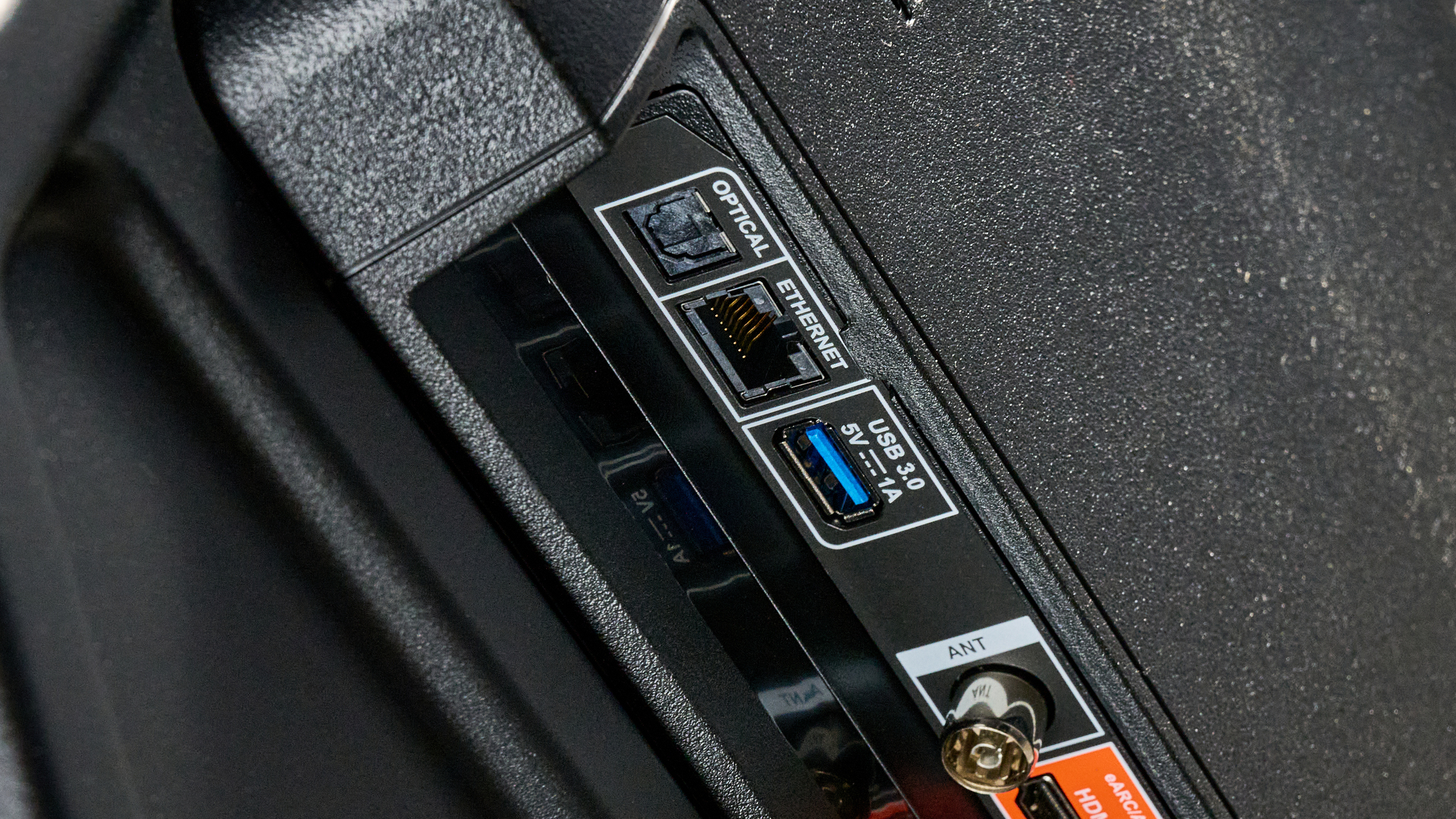 the amazon ember 4-series TV photographed against the blue tom's guide background