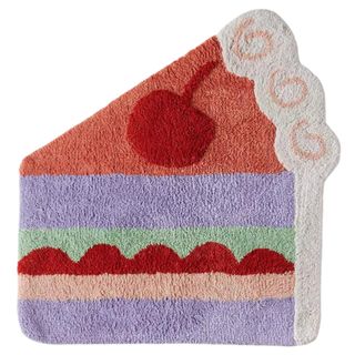 Urban Outiftters 100% cotton tufted cake-inspired bath mat