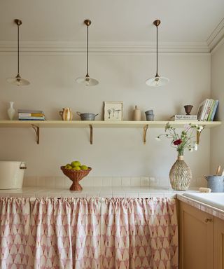 alabaster paint used in pantry/utility room paired with pink and terracotta