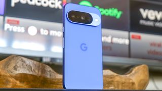 Google Pixel 10 in the hand.