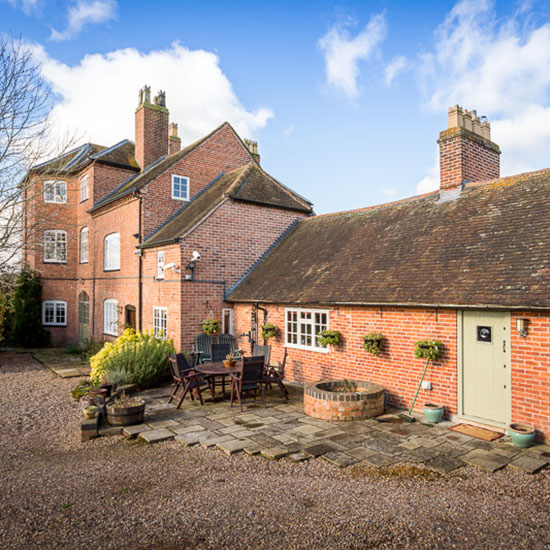 home with brick wall and roof