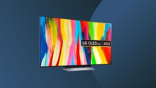 The LG C2 TV set on a graduated dark grey background. 
