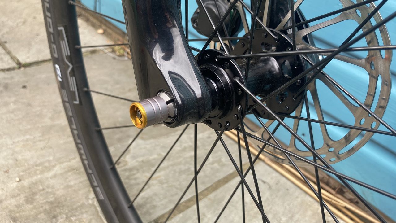 A close-up of the front-wheel thru-axle on a Ribble Hybrid AL Trail