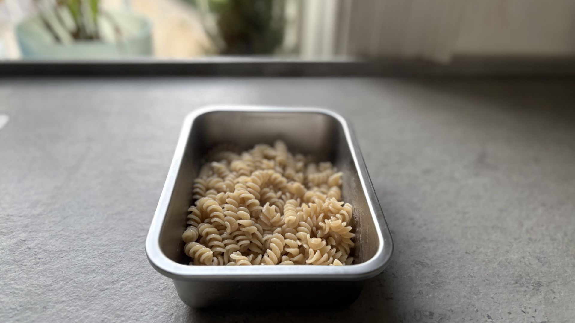 One of the IKEA Stainless Steel Food Containers with pasta