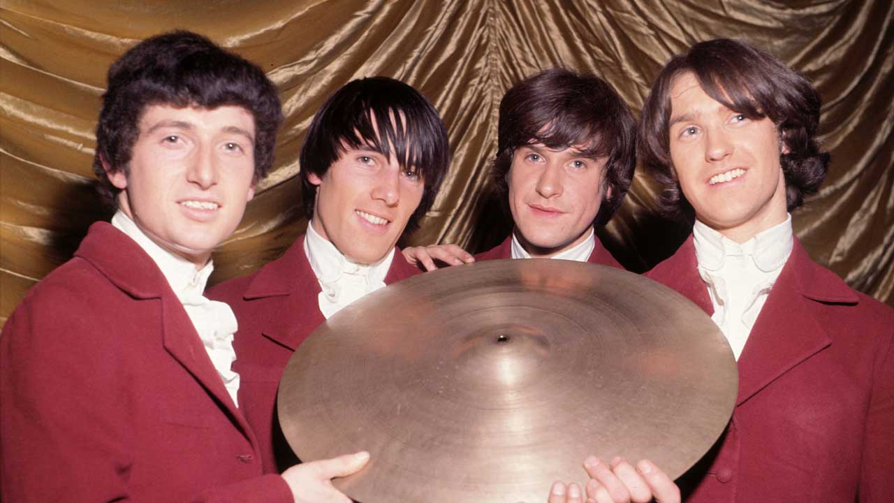 The Kinks holding a cymbal, 1964