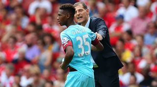 West Ham United manager Slaven Bilic speaks with Reece Oxford of West Ham United during the Premier League match between Arsenal and West Ham United at Emirates Stadium on August 9, 2015 in London, England.