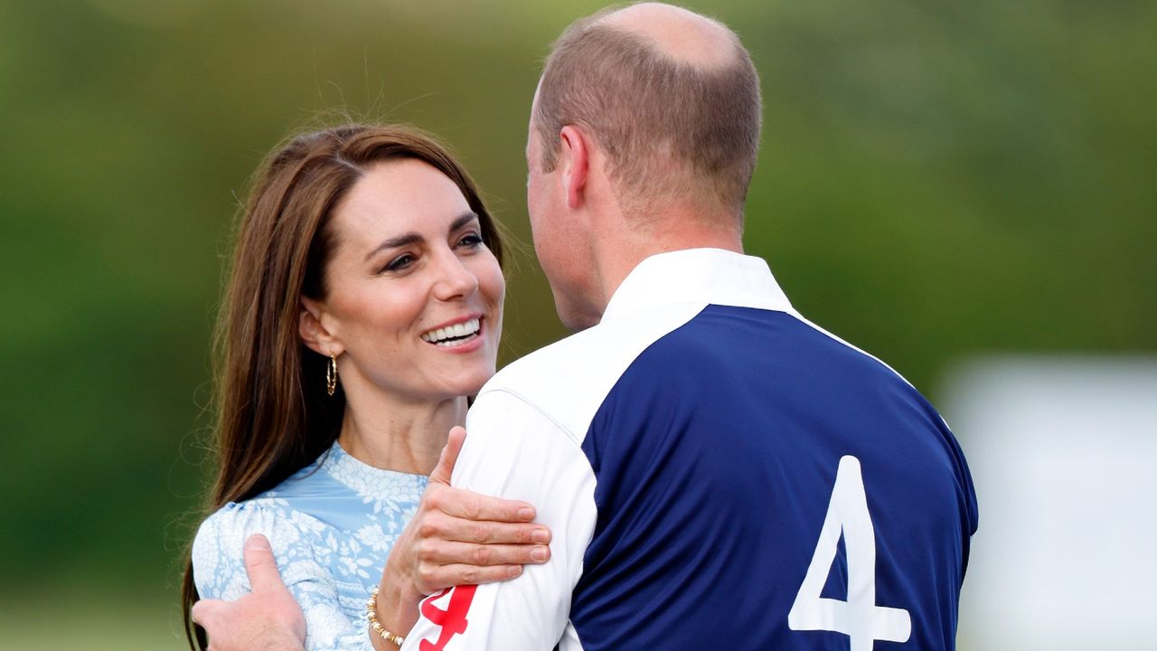 Prince William and Kate Middleton kissing at polo