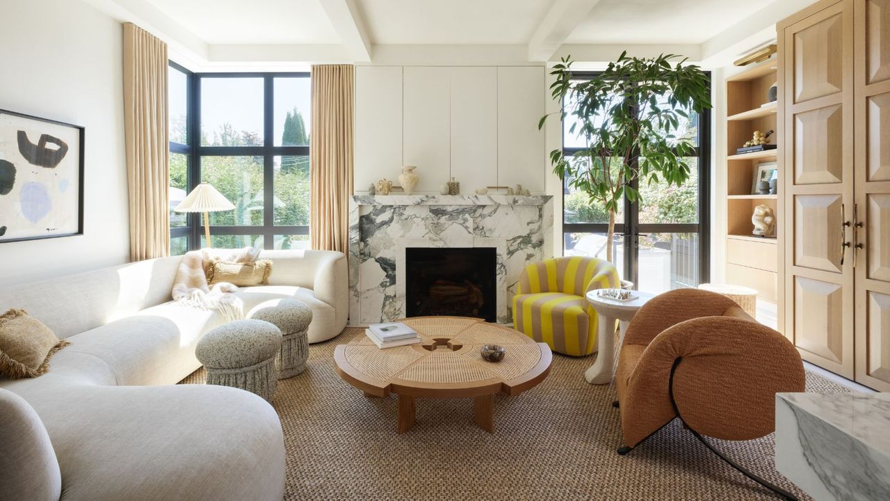 Living room in Vancouver home with marble fire surround