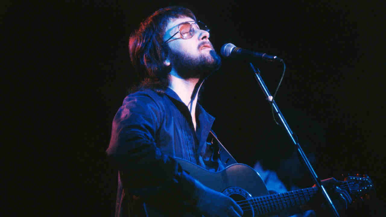 Gerry Rafferty performing onstage in 1978