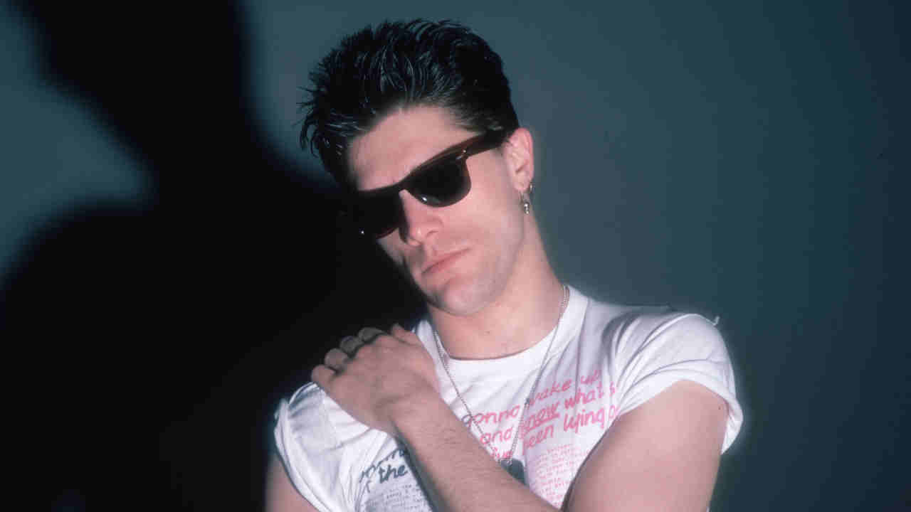 The Clash drummer Pete Howard posing for a photograph in 1984