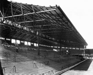 An early image of Liverpool's Spion Kop under construction in 1928.