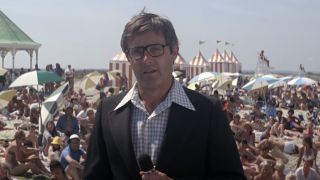 Peter Benchley as a TV reporter on the beach in Jaws