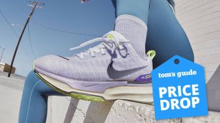 a side-on view of the Nike Invincible 3 in a women's colorway