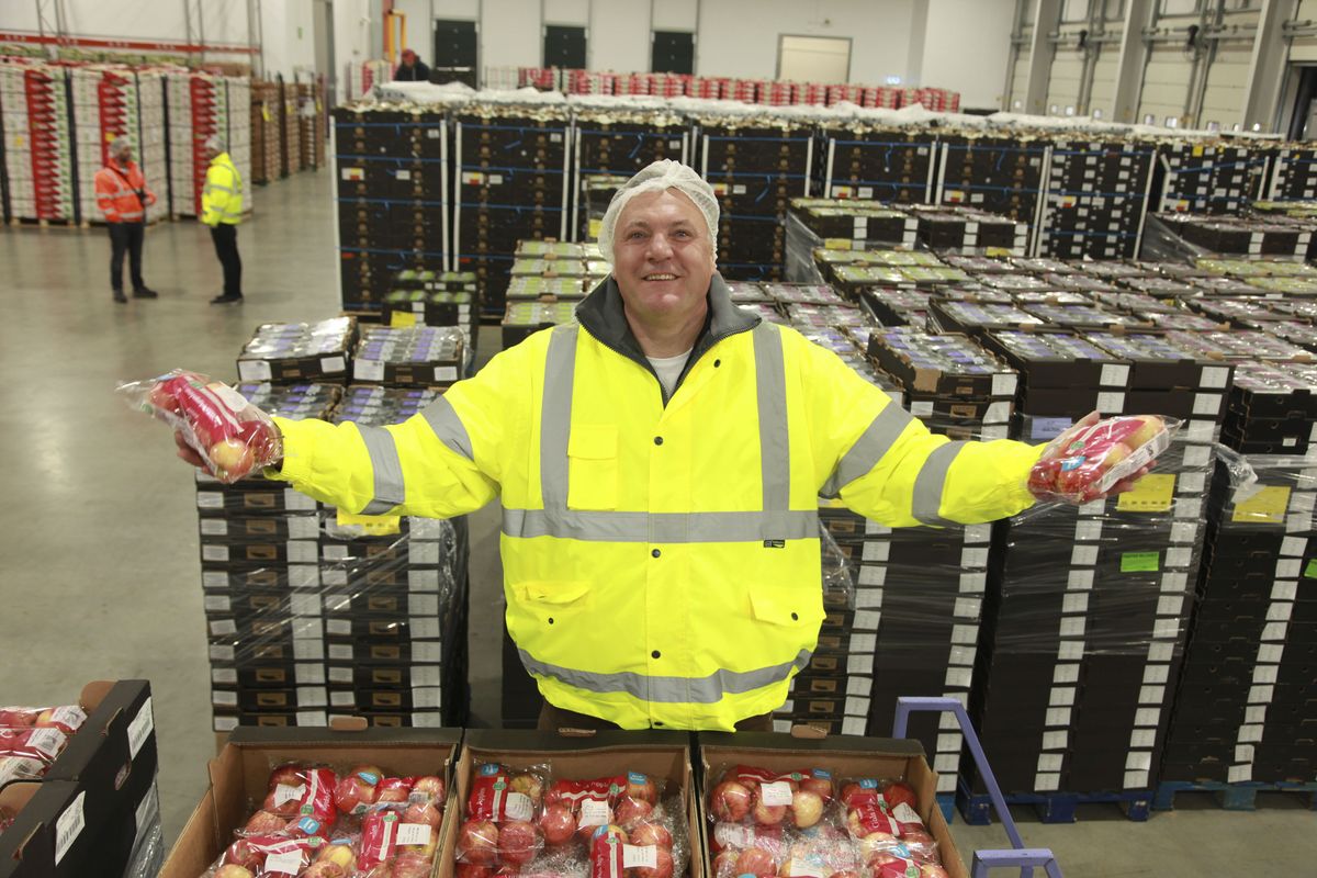 Ed Balls in a warehouse