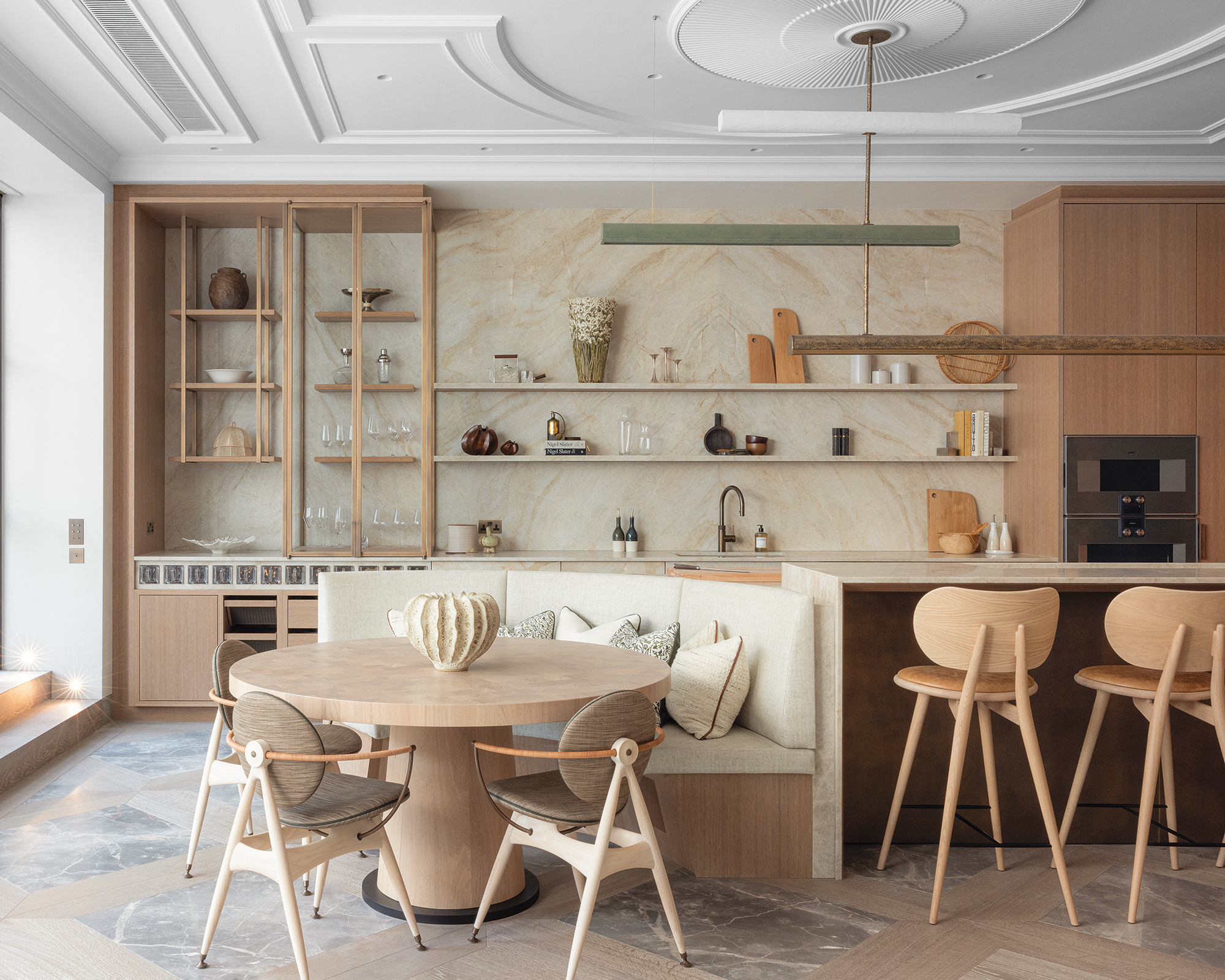 kitchen with long task light over the island and table at the end