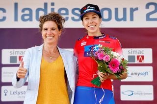 EDE NETHERLANDS AUGUST 31 Georgia Baker of Australia and Team BikeExchange Jayco celebrates winning the Red most combative rider on the podium ceremony after 25th Simac Ladies Tour 2022 Stage 2 a 1178km stage from Ede to Ede SLT2022 UCIWWT on August 31 2022 in Ede Netherlands Photo by Bas CzerwinskiGetty Images