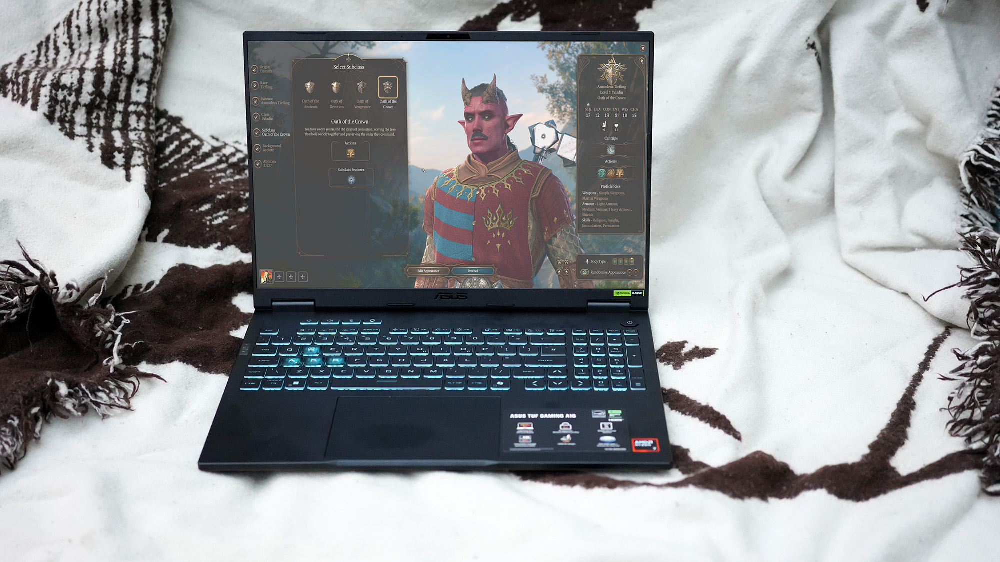 An Asus TUF Gaming A16 2025 on a white background, fit with an RTX 5050.