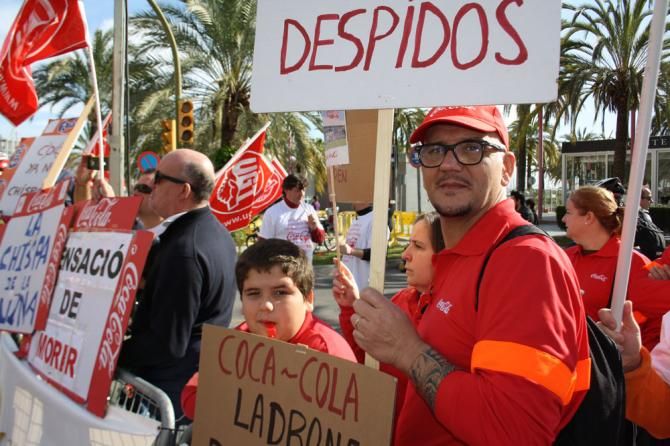 Locals stage a protest at the start with a local Coca Cola factory set to close
