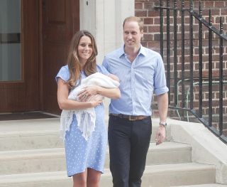 Catherine, Duchess of Cambridge and Prince William, Duke of Cambridge depart The Lindo Wing with their newborn son Prince George.