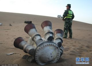 Pieces of Shenzhou 10's escape tower recovered in China’s Inner Mongolia.