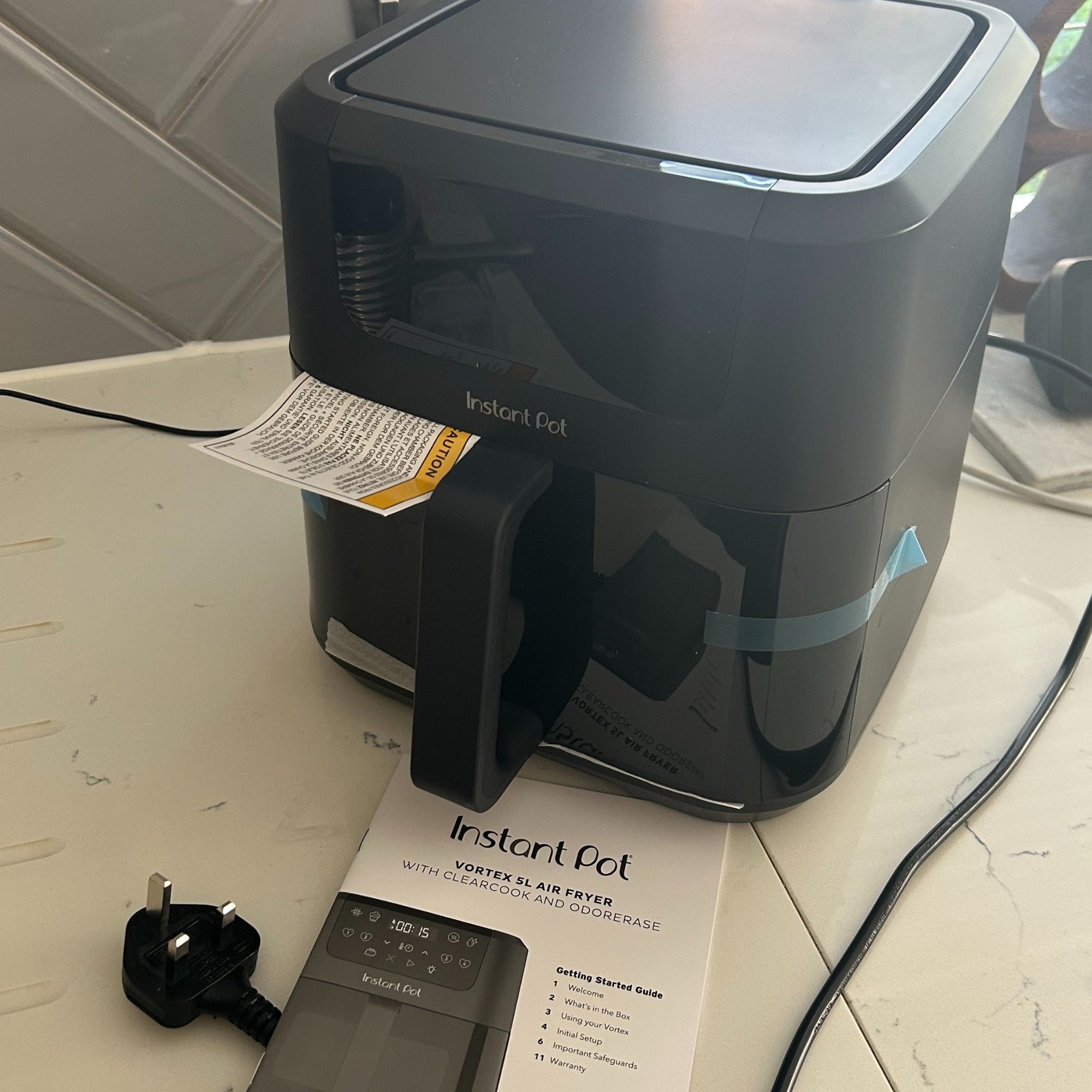 Instant Pot Vortex Compact 5L Air Fryer box contents - main unit, cable and instruction manual