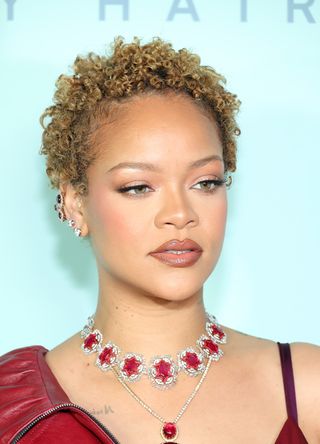 Rihanna wearing lined lips and eyes