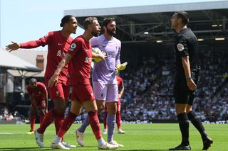 Frustrated Liverpool players during their early season draw with Fulham