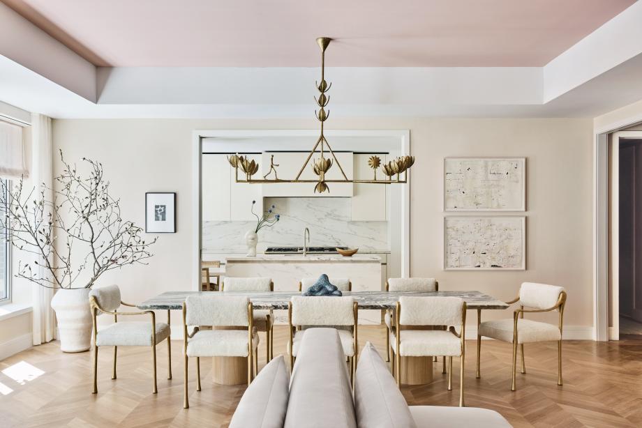 A view of the dining area in Kelly Behun’s Manhattan shoppable apartment opening onto the kitchen