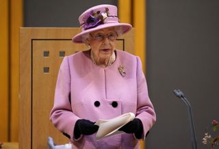 Britain's Queen Elizabeth II speaks during the ceremonial opening of the sixth Senedd, the Welsh Parliament, in Cardiff, Wales on October 14, 2021.