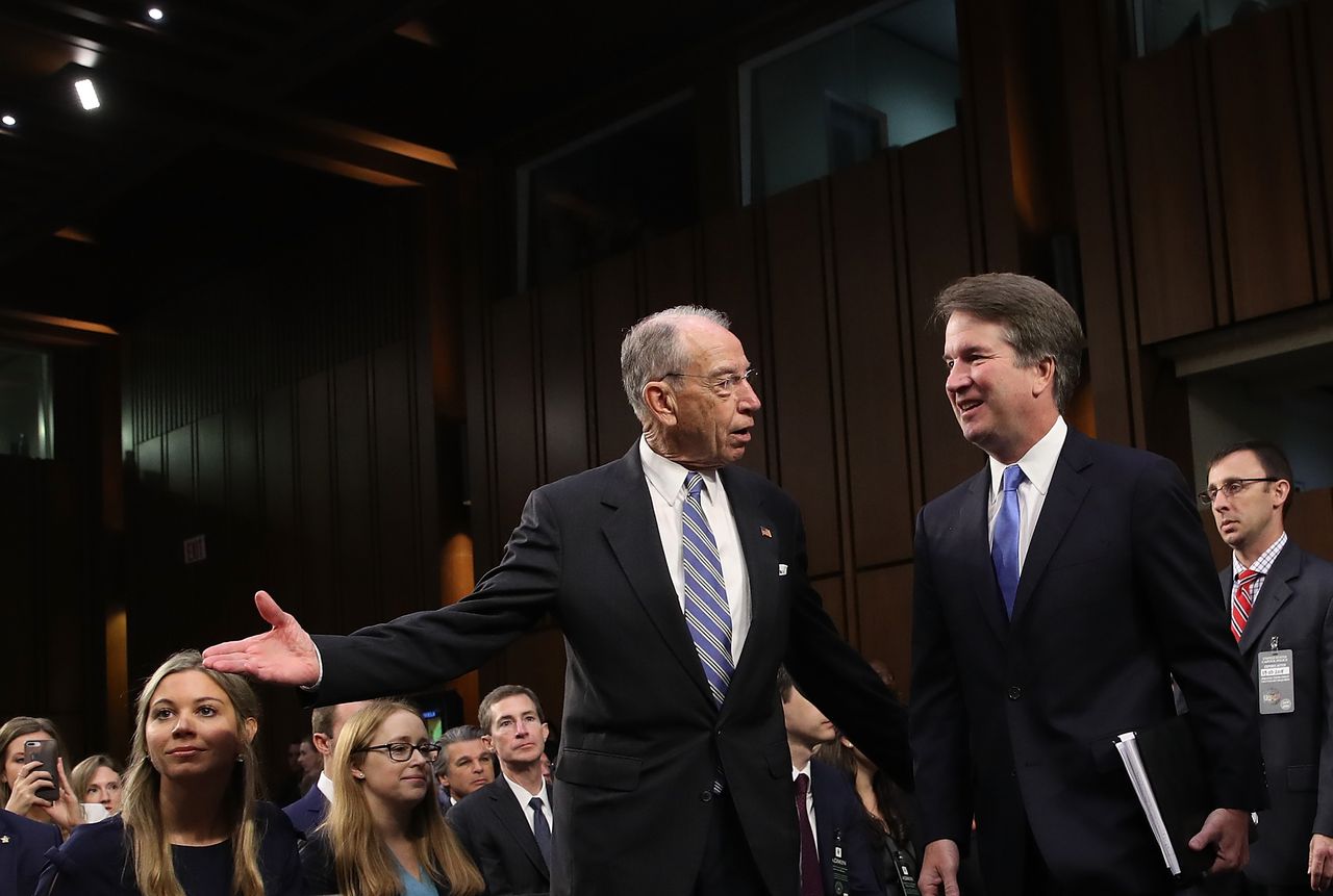 Chuck Grassley alongside Brett Kavanaugh