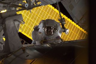 Astronaut Nicole Stott, Expedition 20 flight engineer, participates in the STS-128 mission's first spacewalk of the STS-128 mission to the International Space Station on Sept. 1, 2009.