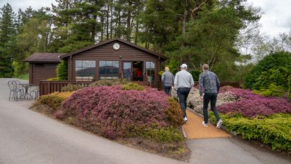 Players using a halfway hut