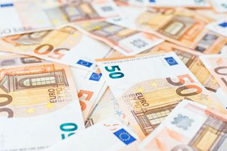 A pile of 50 euro bank notes