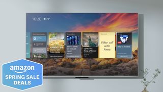 Amazon Fire TV QLED on wall with deals tag