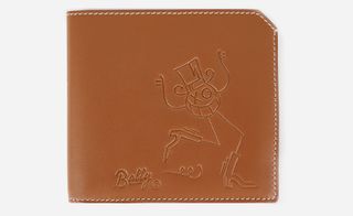 A light brown leather wallet with a cartoon character and the word "Bally" etched into it.