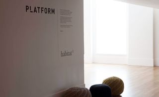A wall with the words 'PLATFORM' written on it along with some unreadable text.
